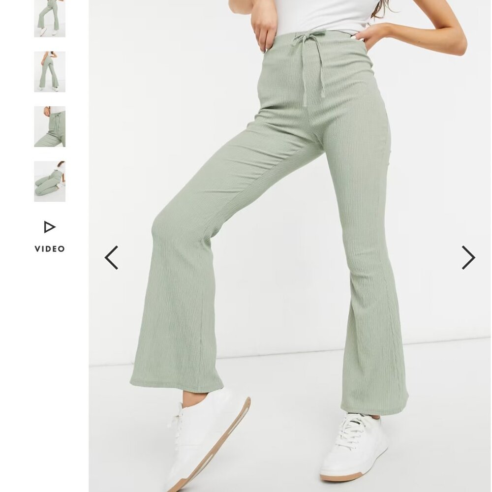ASOS DESIGN textured flare trouser with tie waist in sage